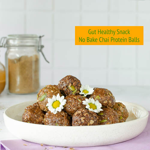brown protein balls with white flower